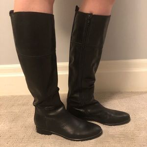 Black knee-high leather boots